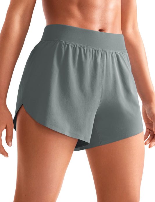 CRZ YOGA Mid Waisted Dolphin Athletic Shorts for Women Lightweight High Split Gym Workout Shorts with Liner Quick Dry Grey Sage X-Small